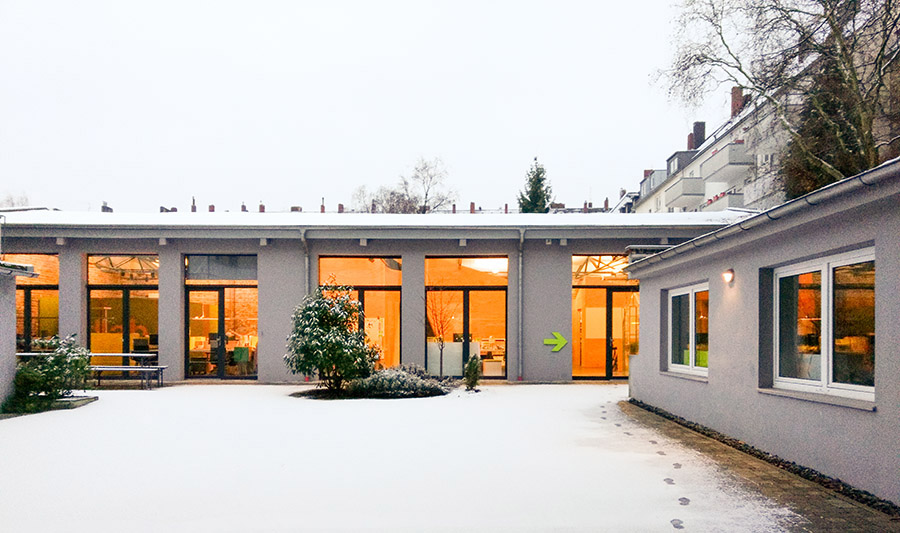 photo exterior view office building dreiform cologne snow