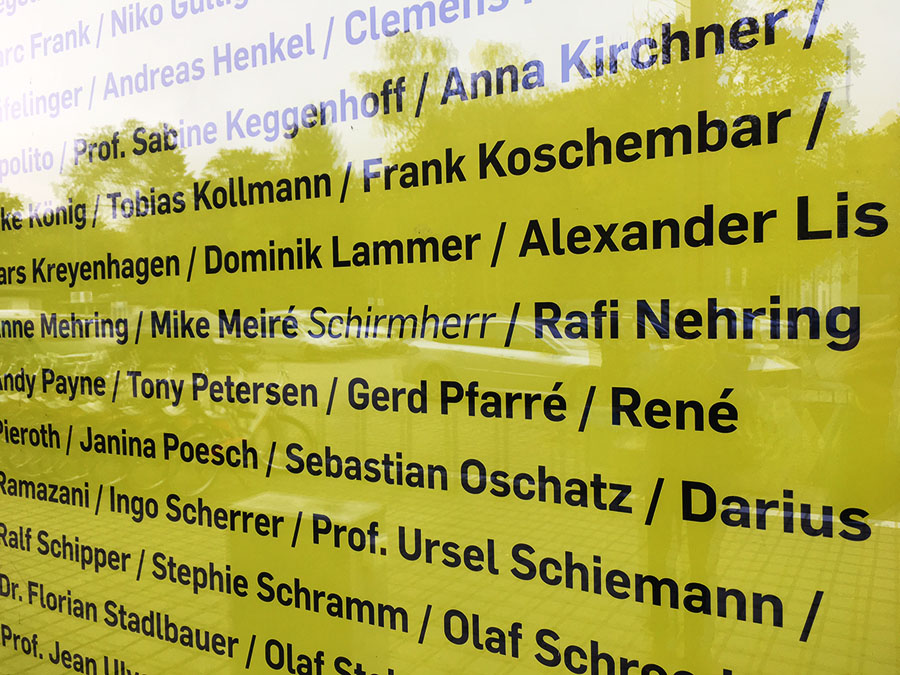 Photo Yellow wall with names
