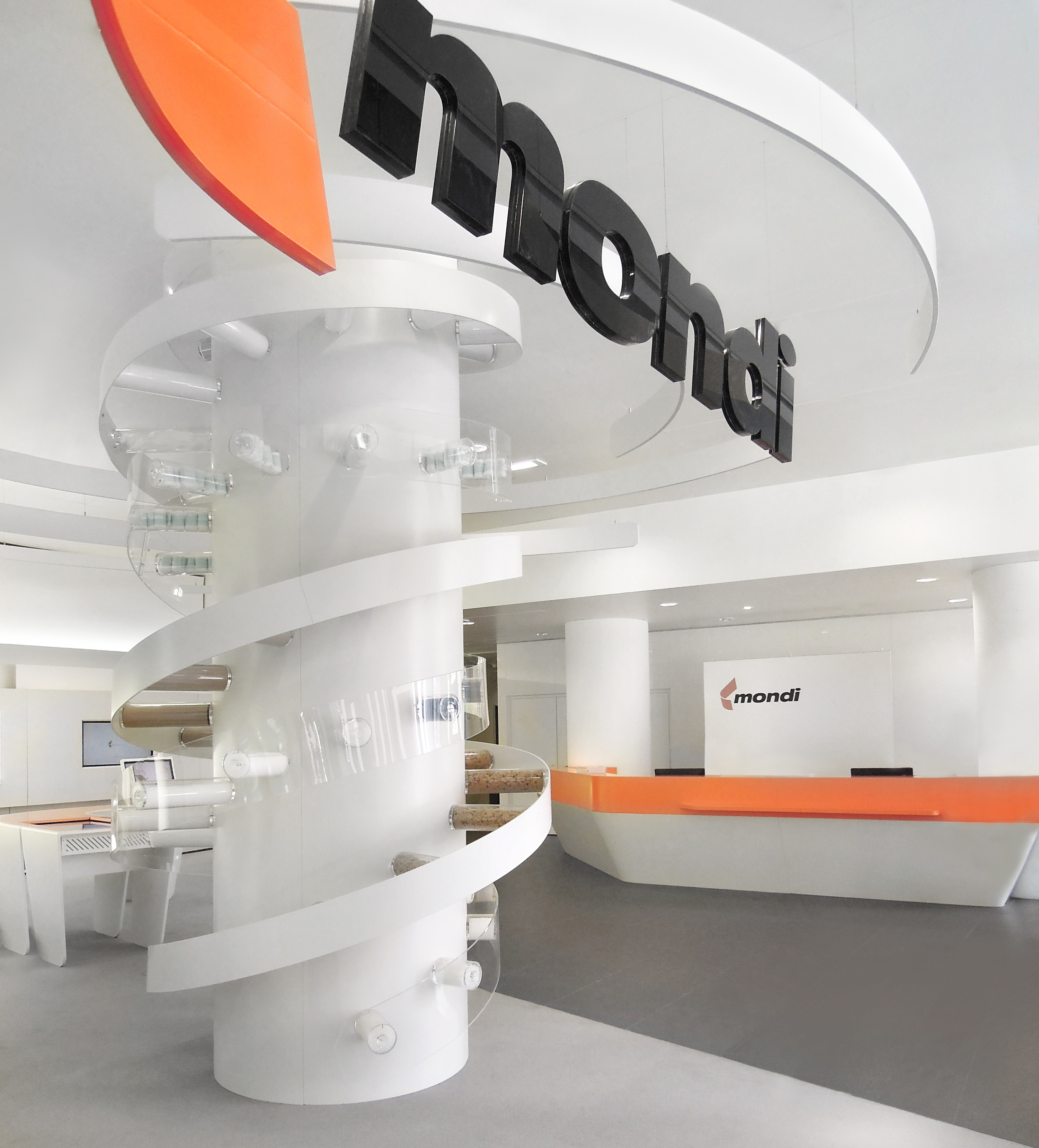 large Mondi logo and aDNA column with Mondi materials. The reception is in the background