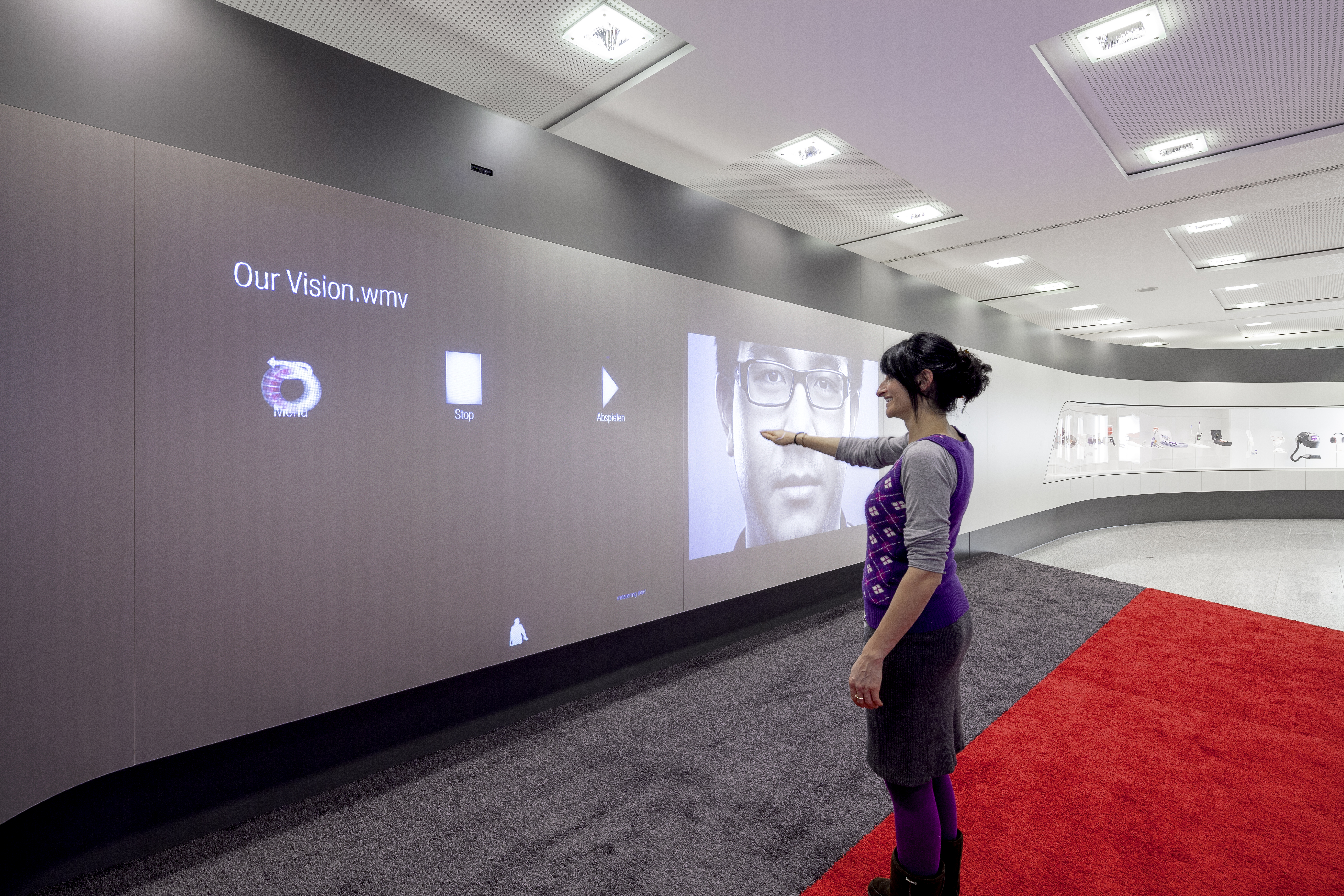 photo 3M World of Innovation boarding waiting area canvas woman operated canvas via gesture control arm hand