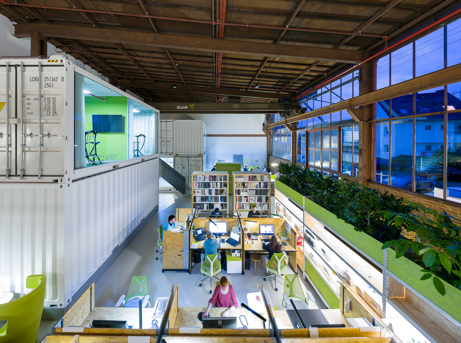 View of various workstations in the office from the gallery